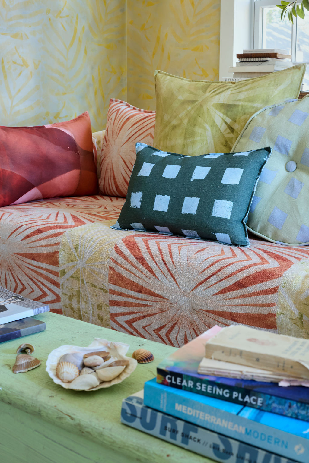 Modernity (Preppy) lumbar, Modernity (Sachet) round and Palmetto pillows on a sofa, detail