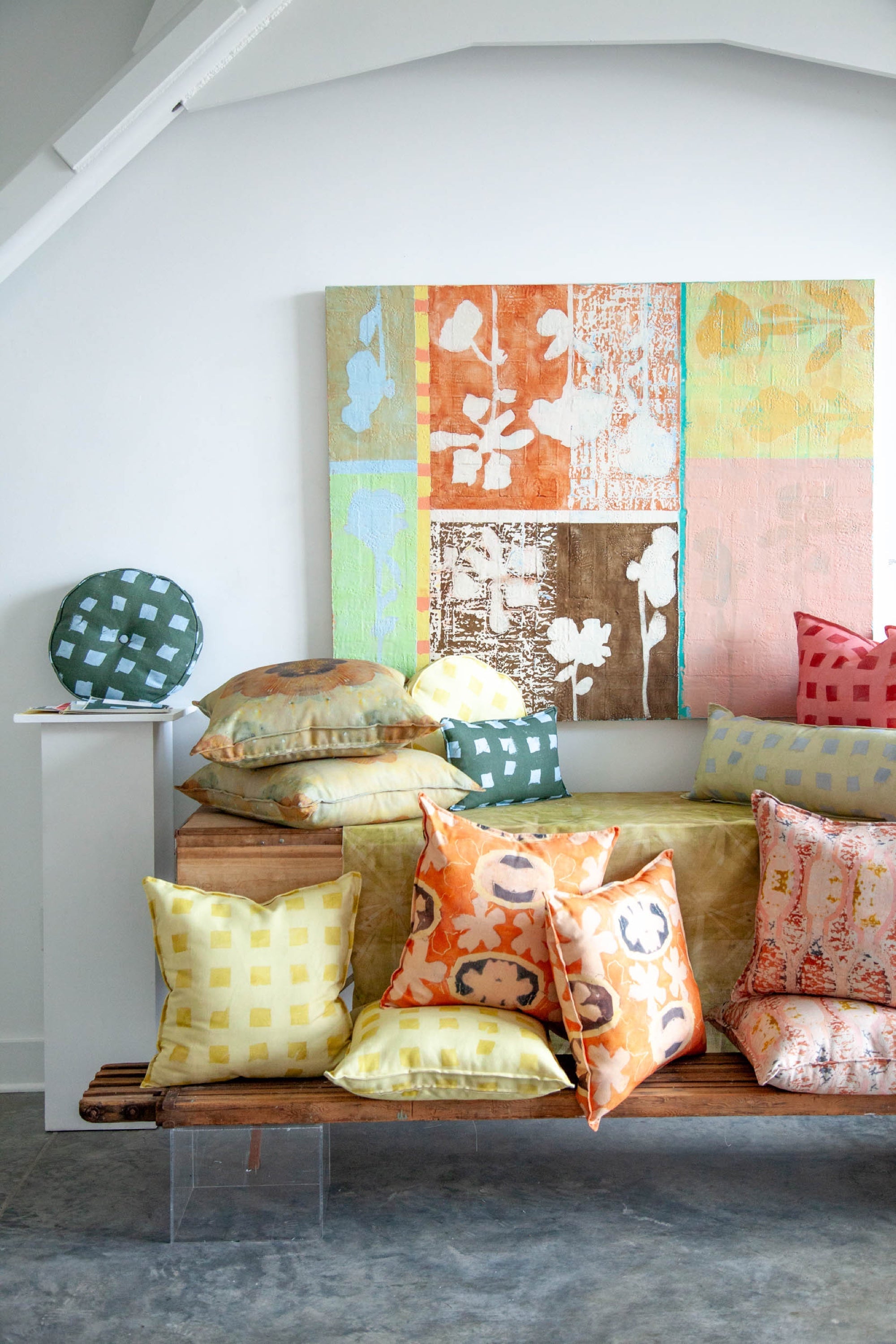 Modernity (Rubber Duck) pillow styled with other Teresa Roche Textiles pillows in the Greenville studio